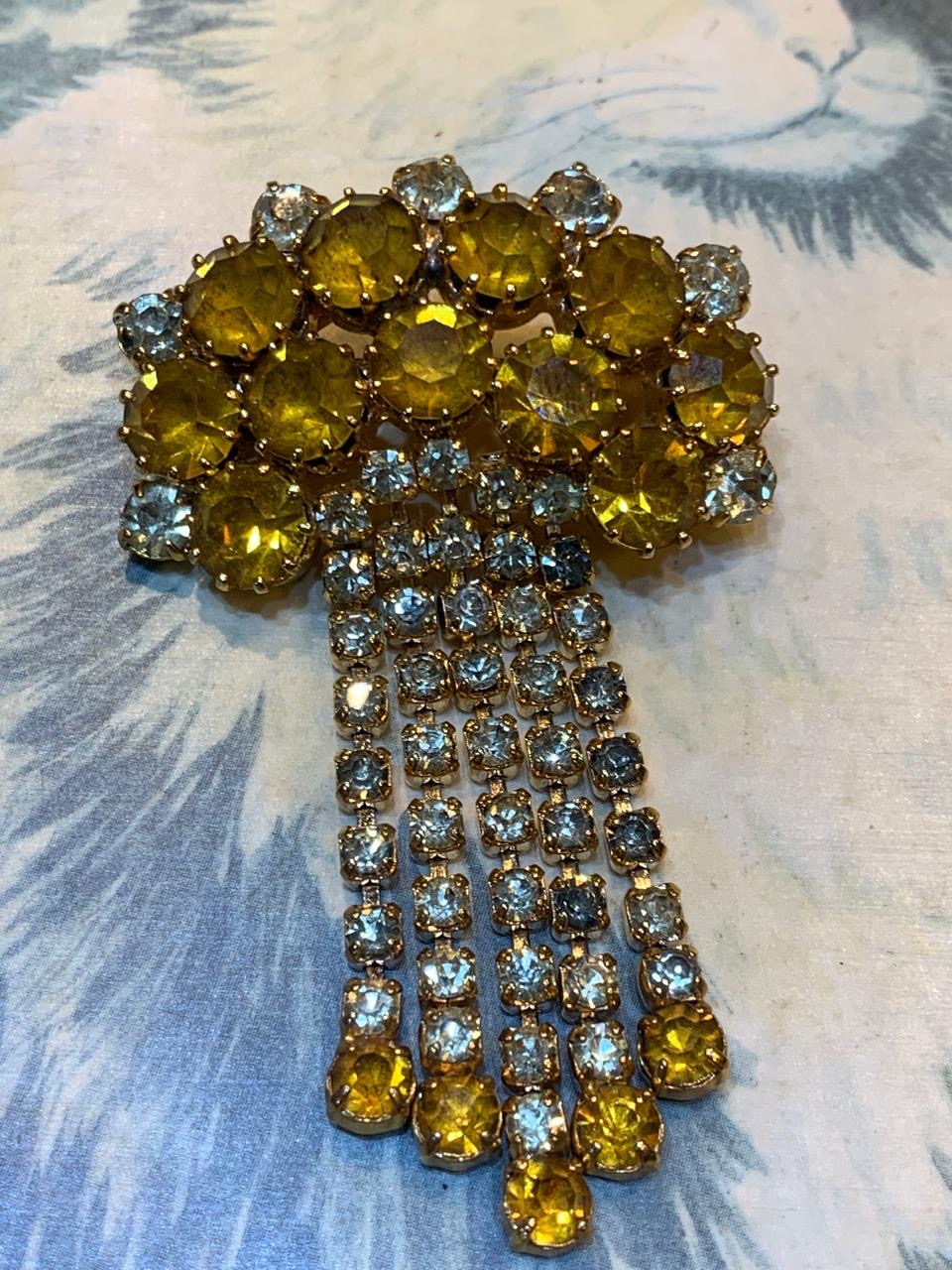 Broche strass dourado