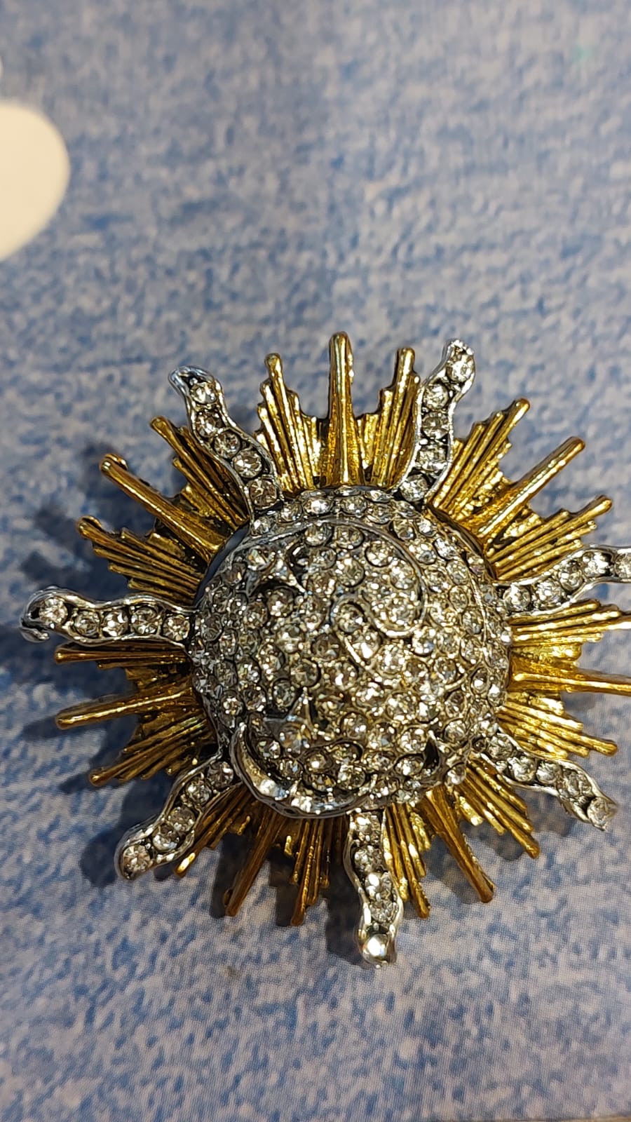 Broche sol