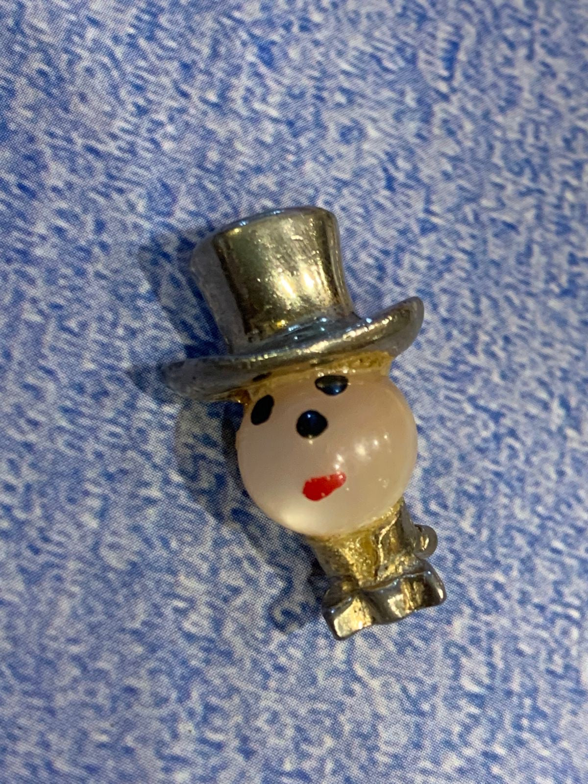 broche homenzinho
