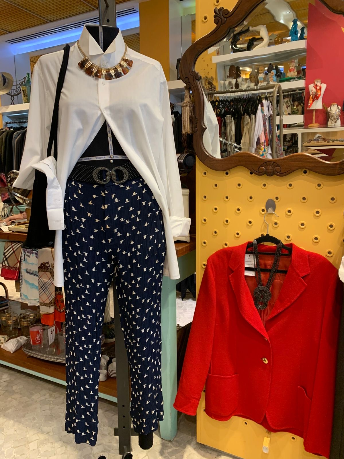 Calça azul estampada de pássaros