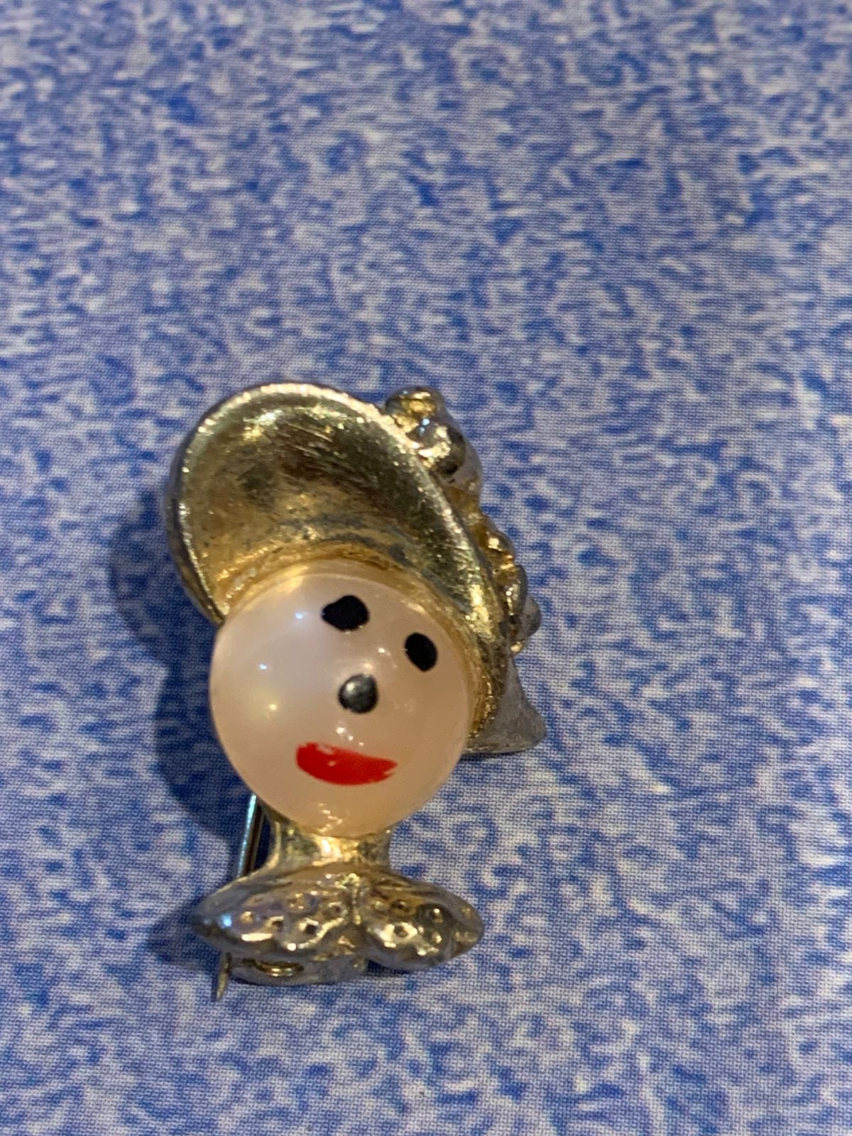 broche homenzinho