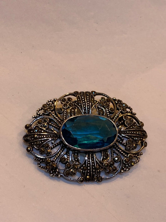 Broche American