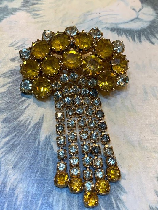 Broche strass dourado