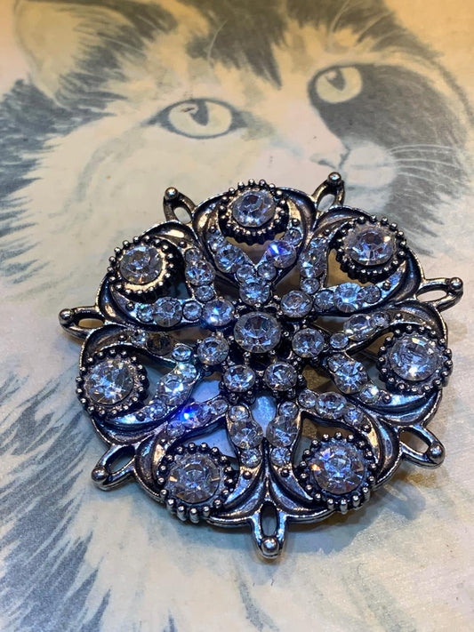 Broche com strass